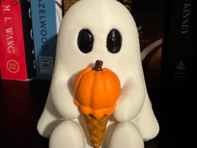 Ghost holding pumpkin ice cream