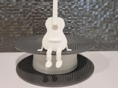 Articulated Companion: Guitar Desk Buddy!