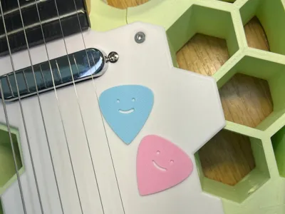 smiling guitar pick