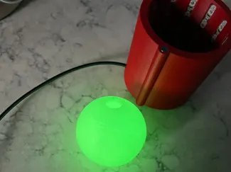 Glow tennis ball charger