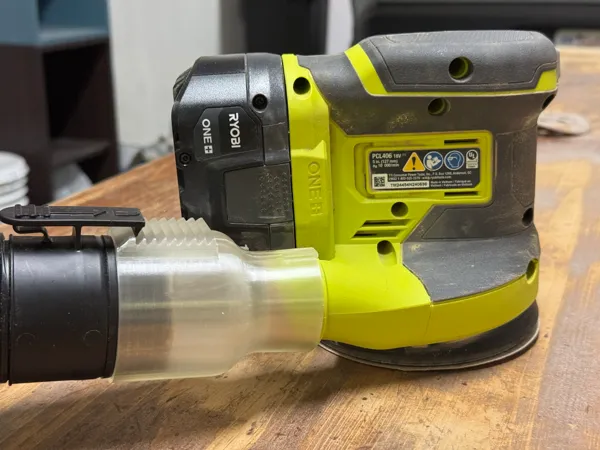 Adaptateur ponceuse circulaire Ryobi vers aspirateur d'atelier