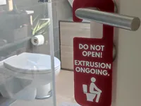 Funny bathroom door sign