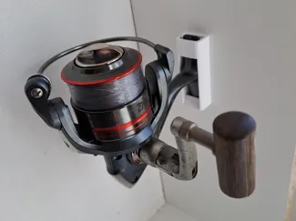 Fishing reel holder - wall mount
