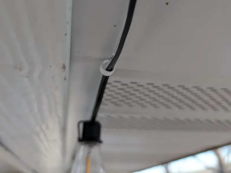 Soffit trim hook/clip for hanging Christmas lights