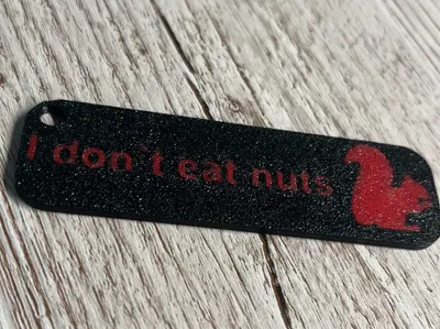 “I Don’t Eat Nuts” – Funny Squirrel Keychain Tag