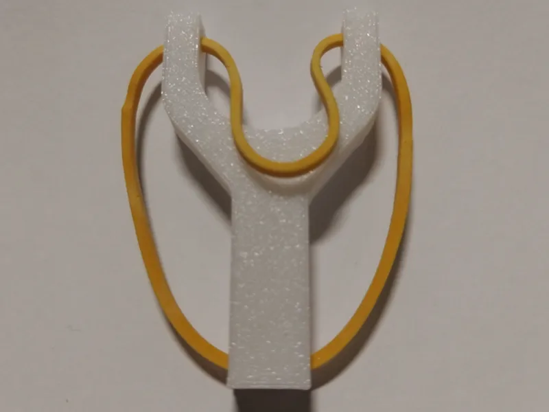 Mini rubber band slingshot