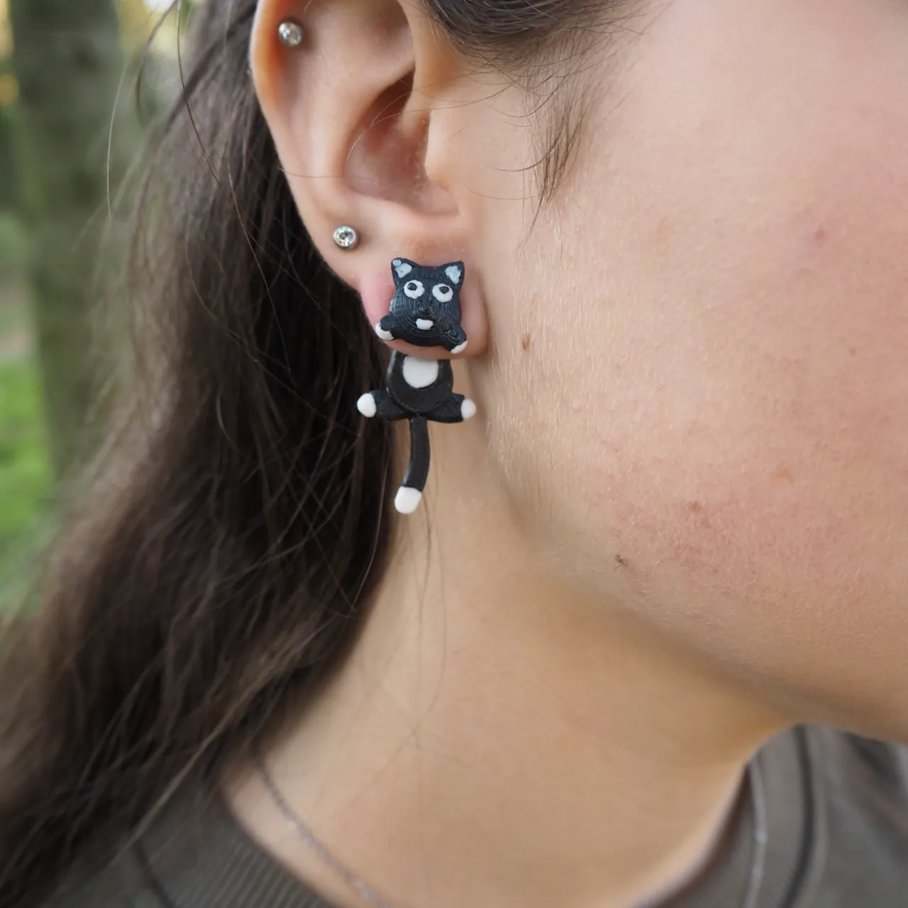 Black and white cat earrings view 2