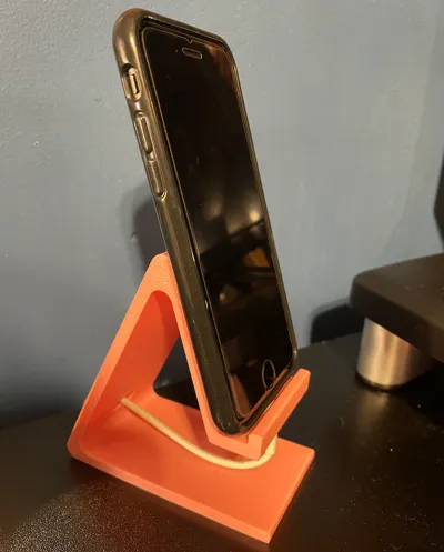 Phone stand with charging hole 