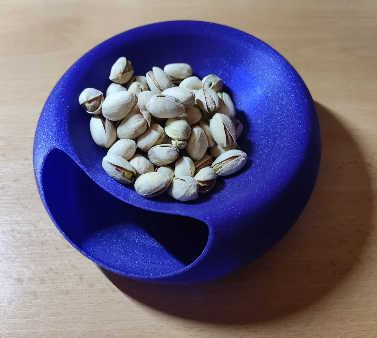 Coupelle à cacahuètes avec réceptacle à coques