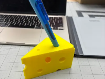 Cheese pencil holder and sharpener