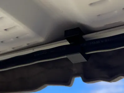 Soffit Clip for power cord extension