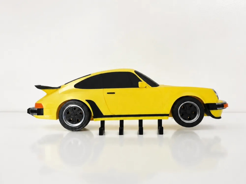 Llavero: Porsche 911 Turbo (930) – Support mural porte-clés. Referencia del modelo original.