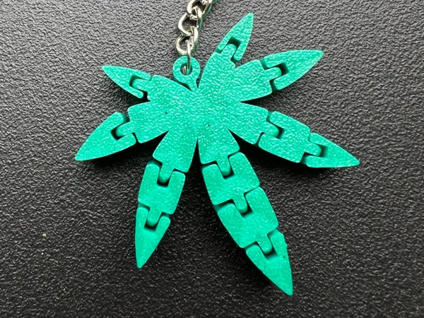 Porte-clés feuille de cannabis articulé