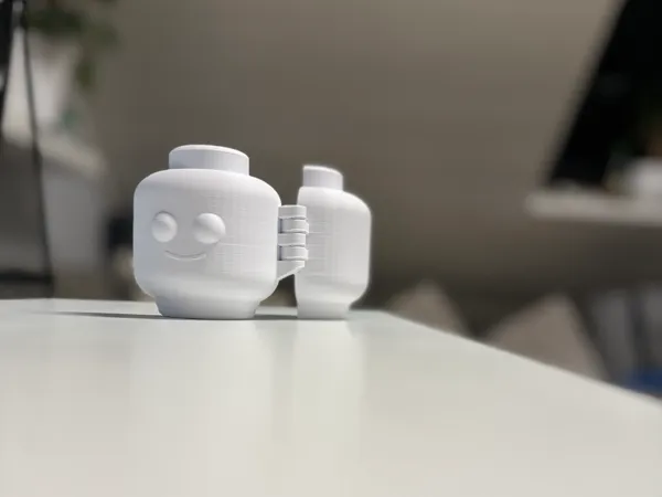 Moule à boule de neige tête LEGO