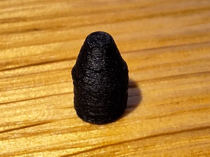 Ski binding hole plug