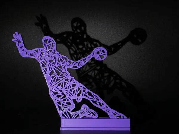 Silhouette géométrique de handballeur en suspension