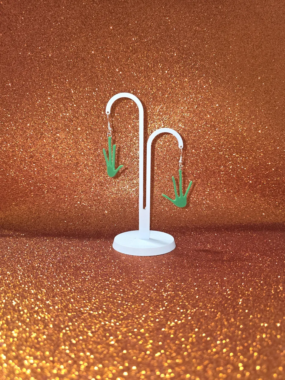 Alien hand earrings view 3