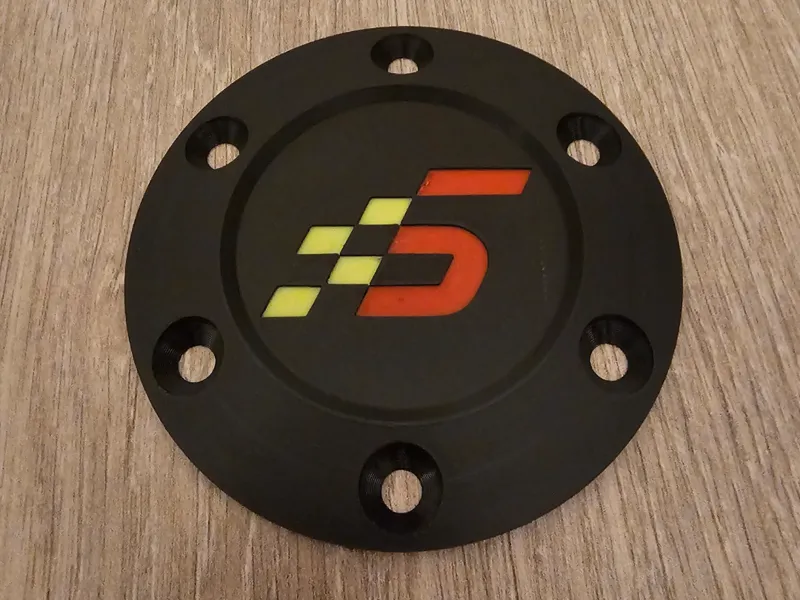 Steering wheel centre cap with Simagic logo