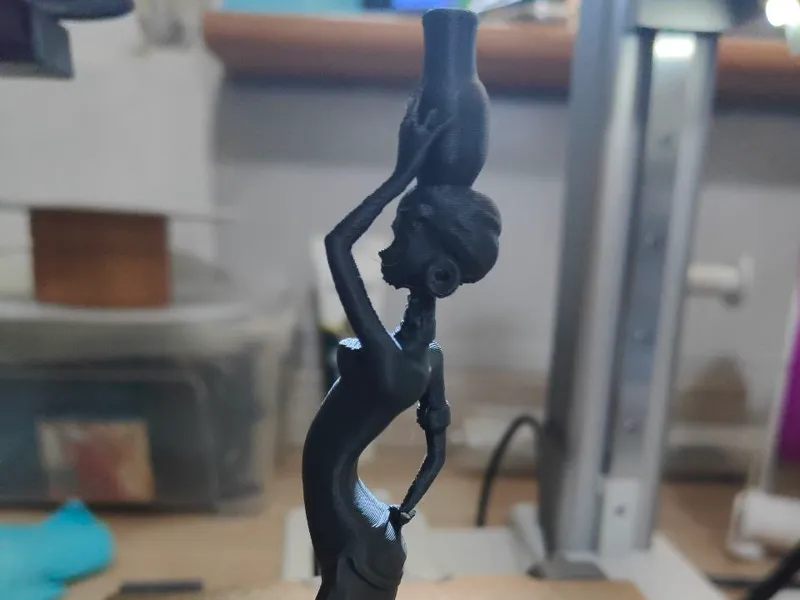 african woman statue