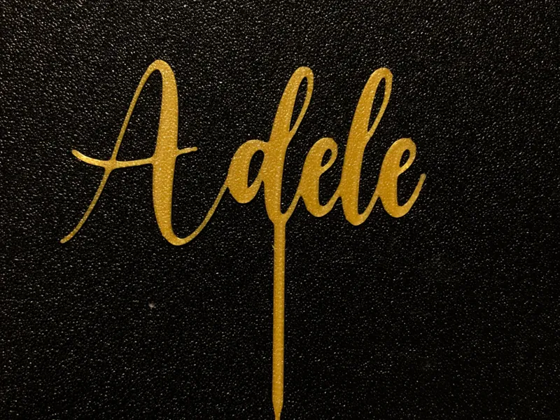 Cake topper name "Adele"