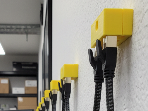 Dual RJ‑45 Dust Cap & UTP Cable Hanger