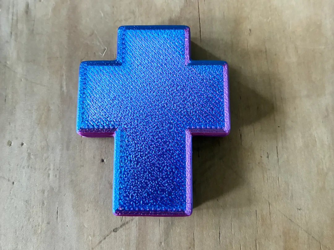 Croix fidget magnétique à cliquets