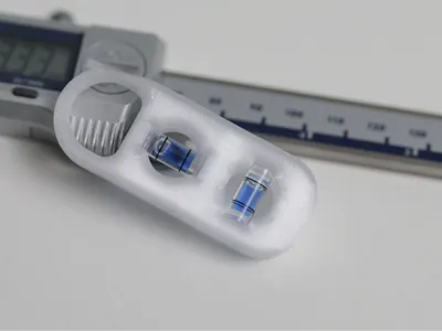 Holder to repurpose Ubiquiti spirit levels