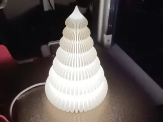 Christmas tree stand with a socket for an LED lamp