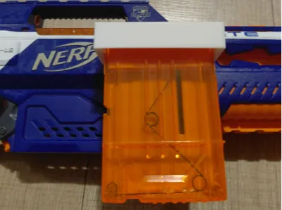 Nerf magazine holder attachment pull to release