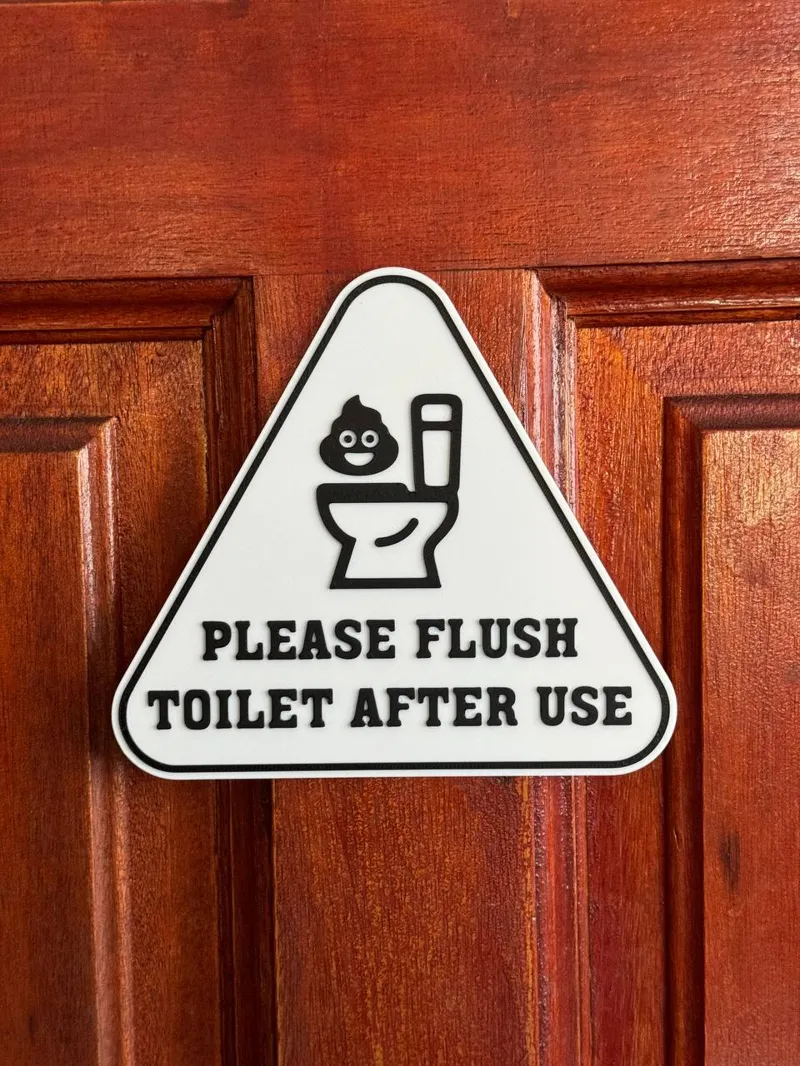 Please Flush Toilet After Use sign