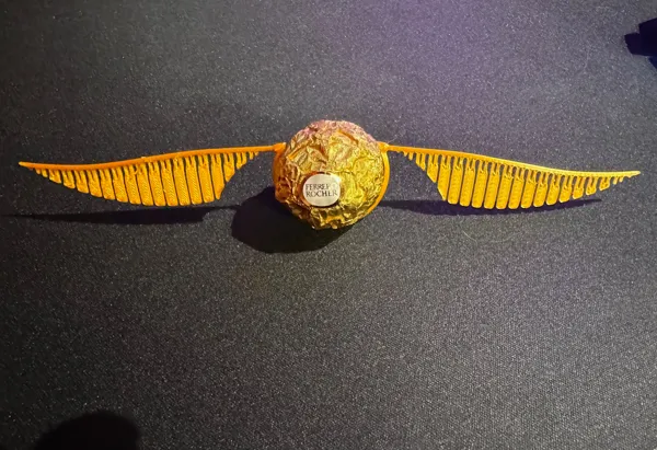 Pince vif d'or Harry Potter pour chocolat