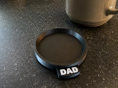 Coaster with dad nametag