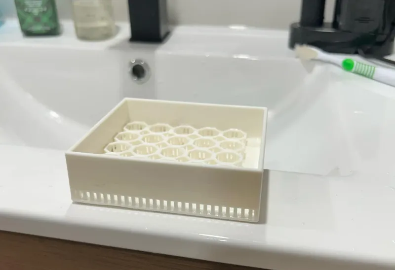 Soap holder with water drip