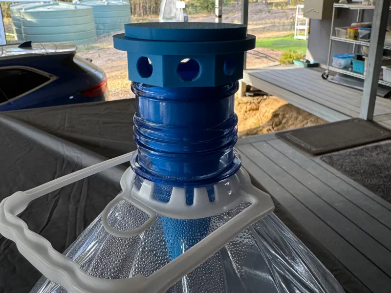 Fly trap for water cooler bottles