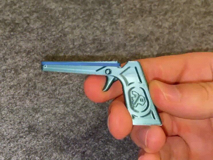 Tiny Rubber Band Gun V2 (print in place)