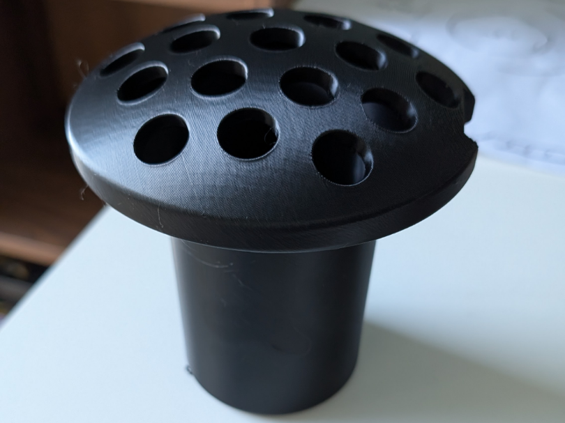 Flower holder for cemetery gravestone