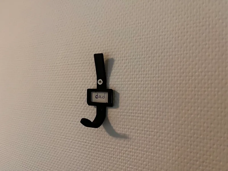Coat hook with space for nametag