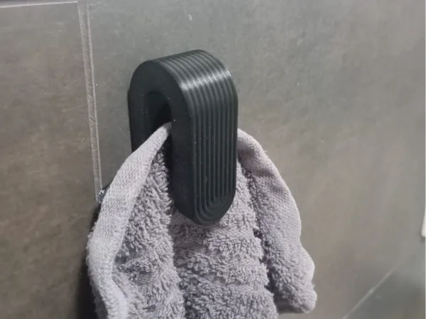 Porte-serviette à pression