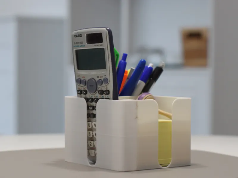 Pencil holder with sticky notes compartment