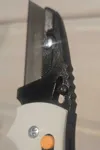 Blade holder with a thumb stud + ribbed for your pleasure