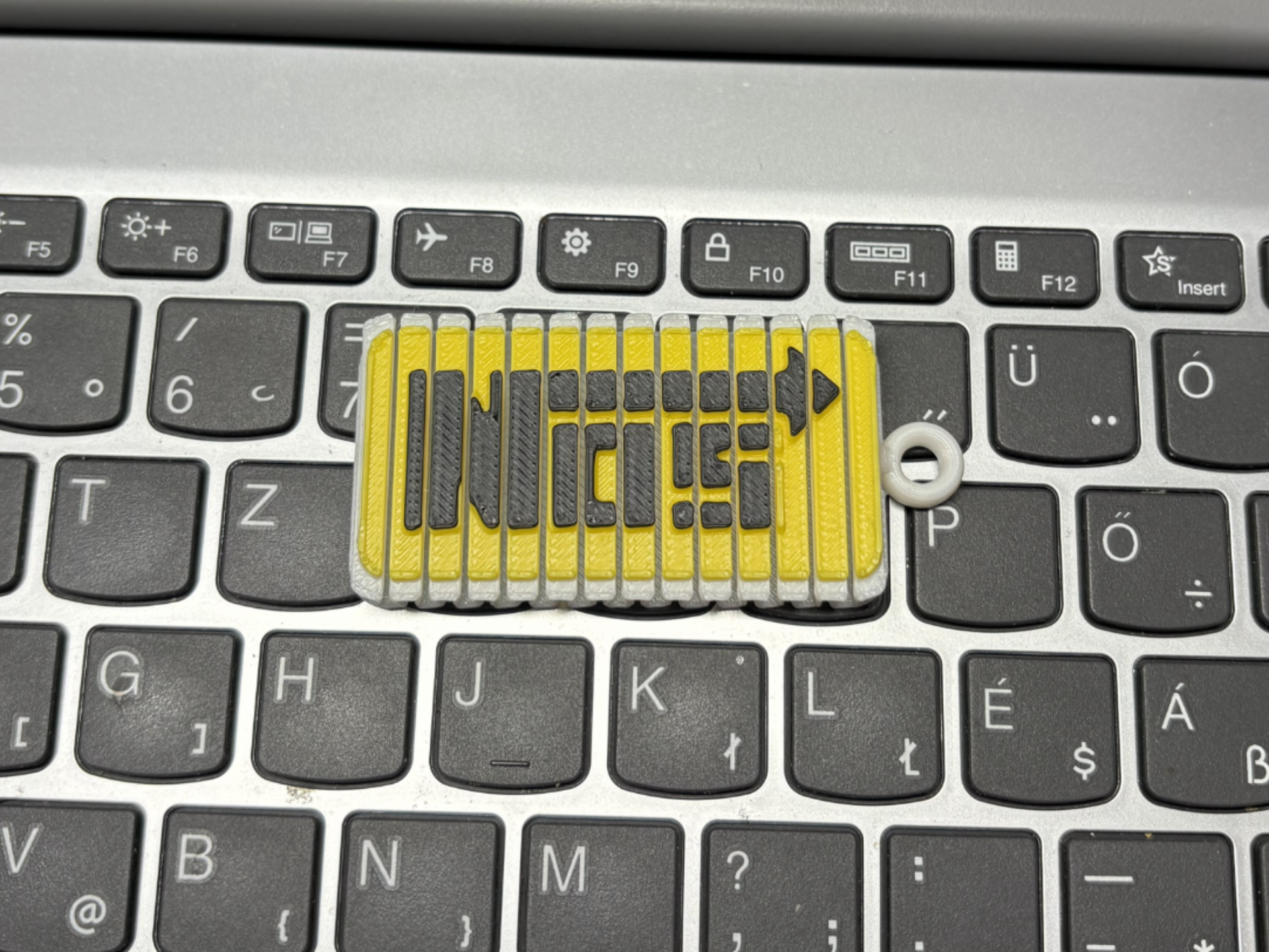 NOS logo Flexi Keychain