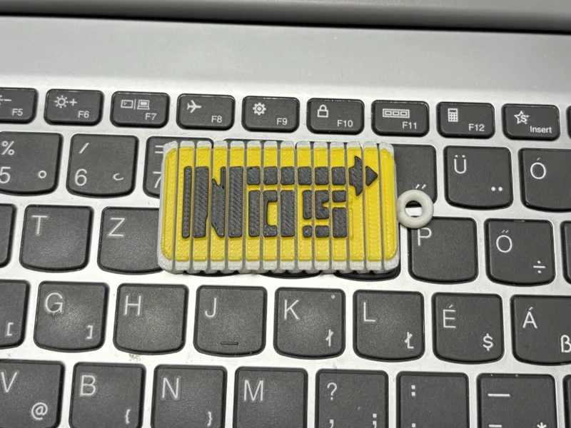 NOS logo Flexi Keychain