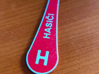 Practical keychain token for shopping carts.