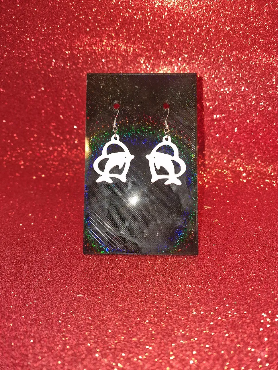 Heart dolphin earrings view 2