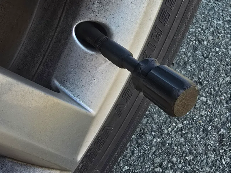 Wheel valve cap wrench