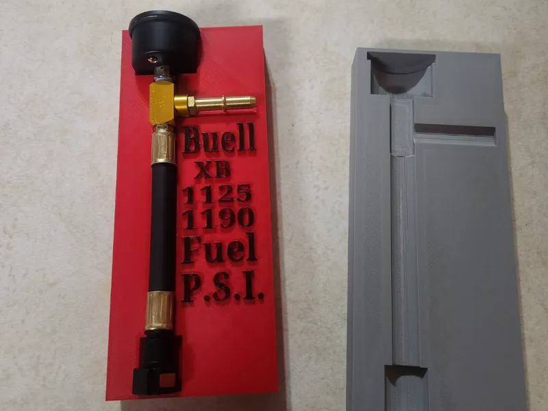 Buell XB fuel pressure gauge case with text