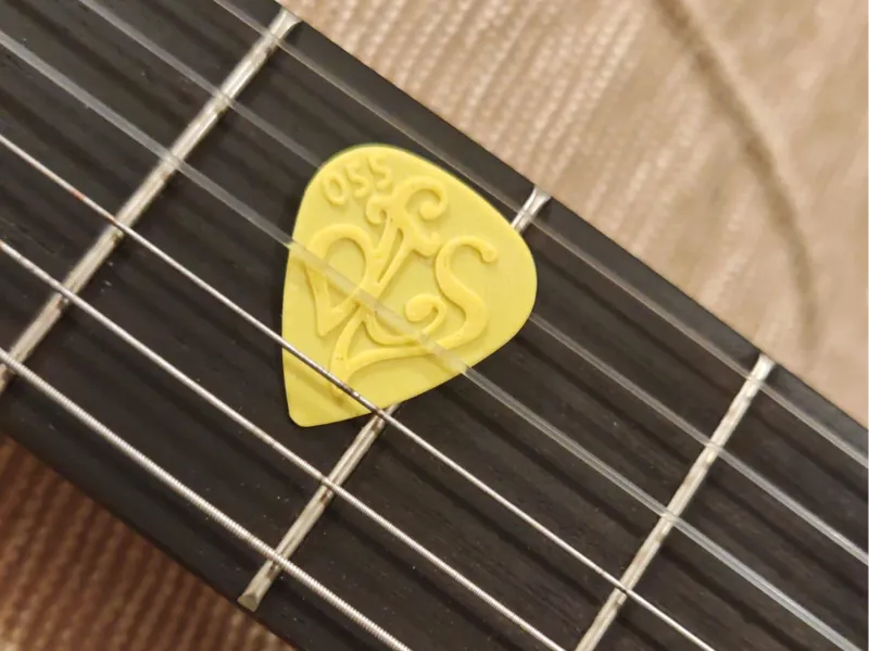 Plettro per chitarra