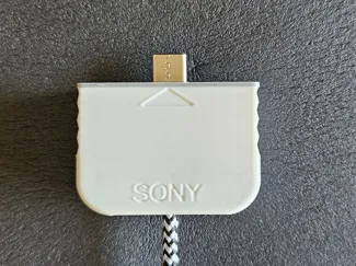Parametric PlayStation controller cable housing