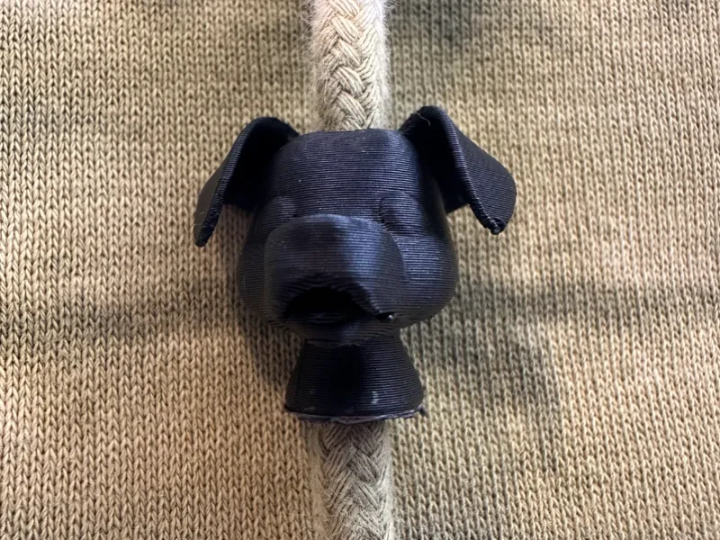 Dog head drawstring bead
