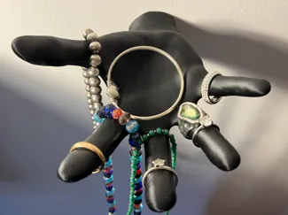 Hand-shaped wall shelf